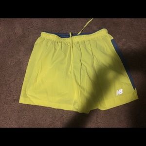 New Balance men’s shorts 5” inseam medium yellow